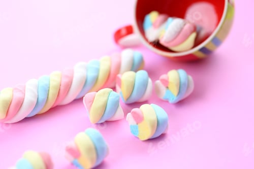 Preview: Yummy marshmallow closeup on pink texture background