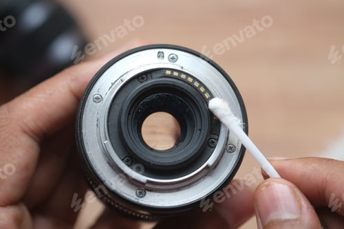 Preview: close up of cleaning camera lens