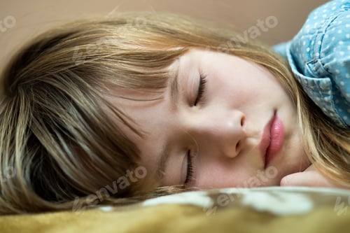 Preview: Portrait of a pretty child girl sleeping in bed