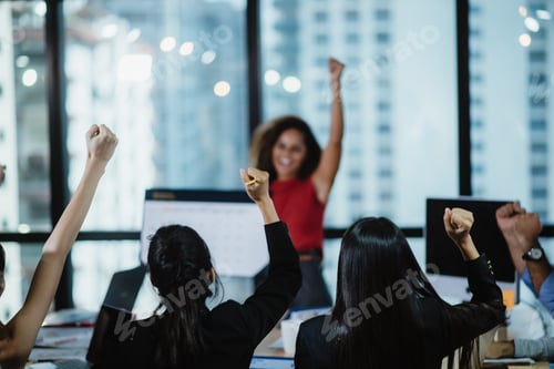 Preview: Closeup rear view of young businesswoman sitting together in conference meeting
