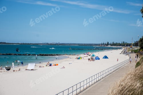 Preview: Discover Sydney: Ramsgate Beach. People enjoy kitesurfing, sunbathing swimming and walking