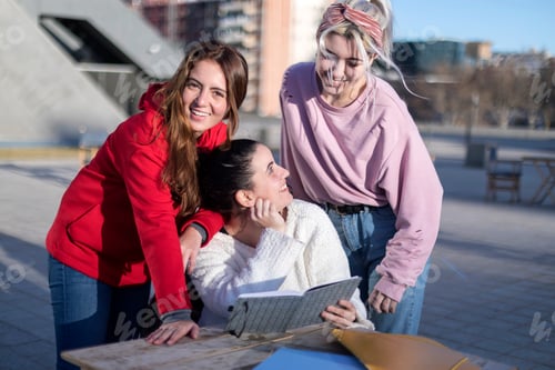 Preview: Group study session outside.