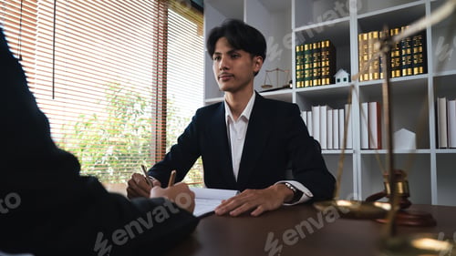 Preview: Home loan insurance, Male lawyer or judge Consult with client and working with report the case on