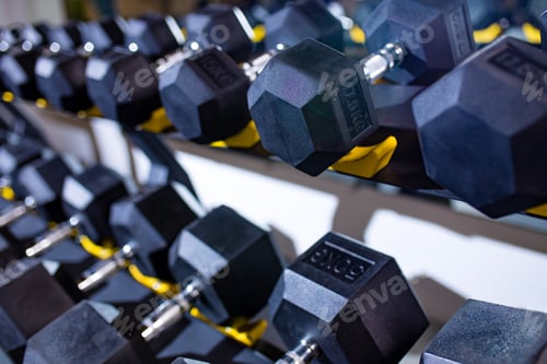 Preview: close up shot of dumbbells in modern gym
