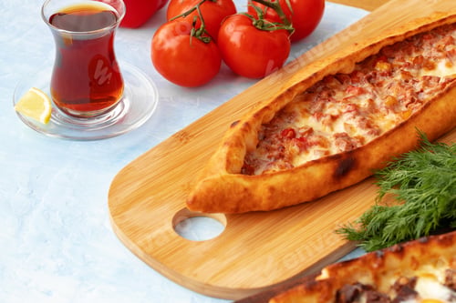 Preview: Close up of Turkish Pide bread on wooden table