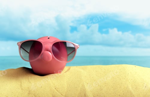 Preview: Summer piggy bank with sunglasses on the beach