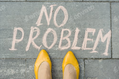Preview: Female feet with text no problem written on grey sidewalk
