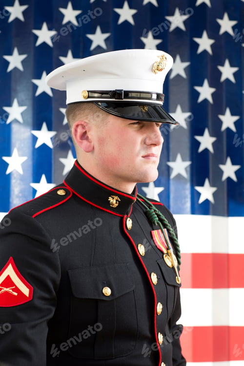 Preview: Serviceman in dress blues by US flag