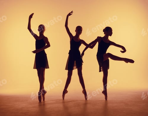 Preview: Composition from silhouettes of three young dancers in ballet poses on a orange background.
