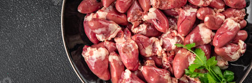 Preview: Chicken heart raw chicken offal tasty dish Fresh gourmet food background on the table rustic food