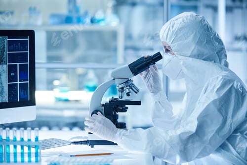 Preview: Scientist examining the virus with microscope