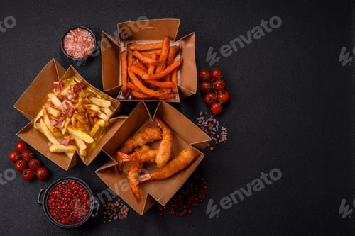 Preview: Crispy French fries with pieces of bacon, salt and spices