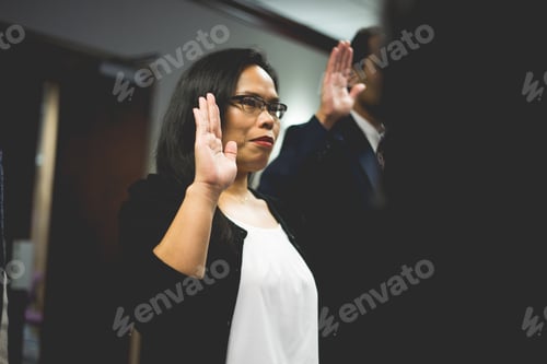 Preview: Woman taking oath