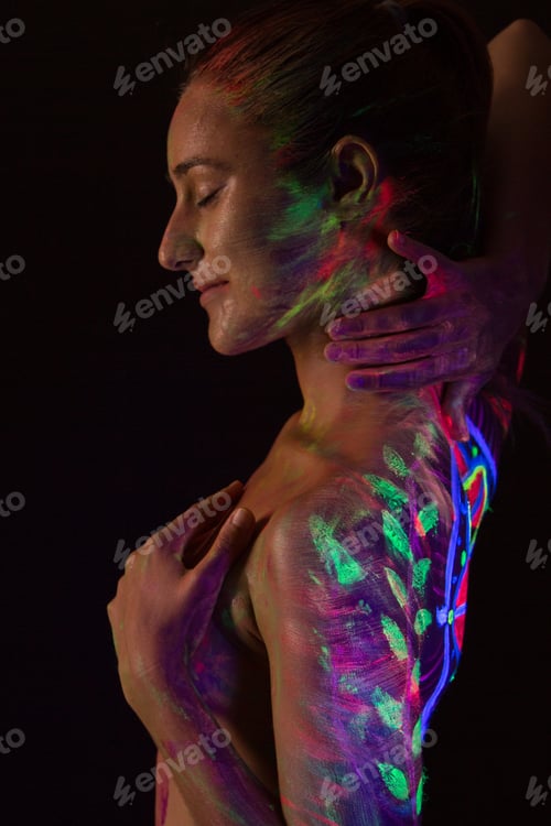 Preview: Topless model in neon lights