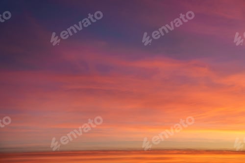 Preview: Incredible sky at sunset. Saturated yellow sky. Lilac clouds.