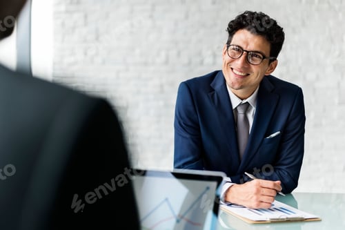 Preview: Cheerful Businessman in a Meeting at the Office