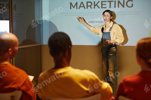 Preview: Young Woman Presenting At Business Conference