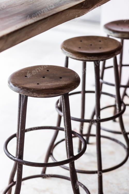 Preview: Bar with wooden vintage round tall chairs