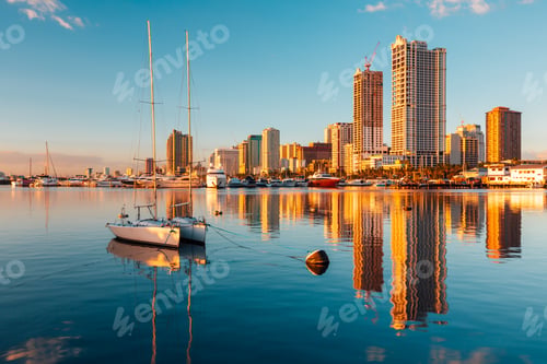 Preview: Skyscrapers and their reflection on the lake in Manila Bay Manila Philippines