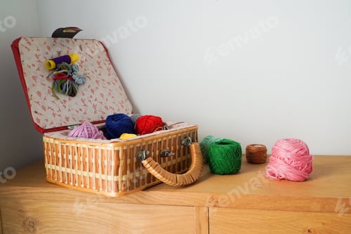 Preview: Sewing basket with colorful yarn and knitting supplies