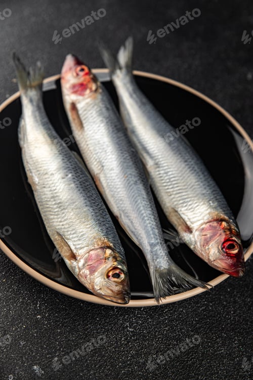 Preview: fresh herring fish raw seafood tasty fresh eating cooking meal food snack on the table copy space