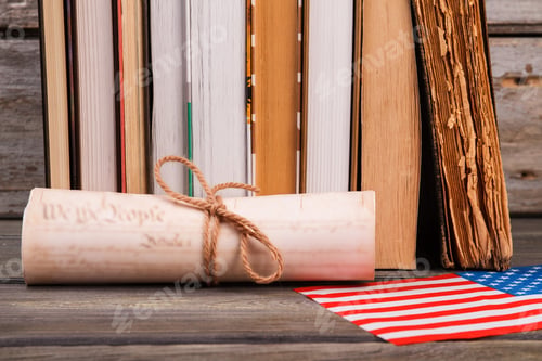 Preview: Scroll with books and usa flag.