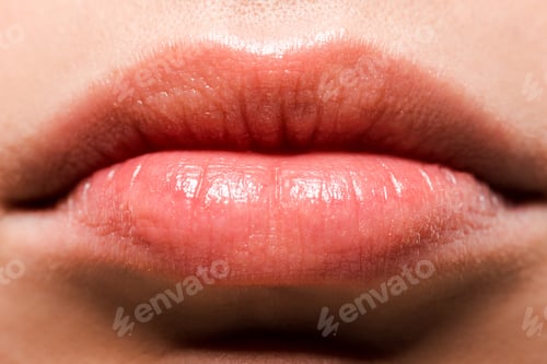 Preview: cropped view of shiny lips with lip gloss