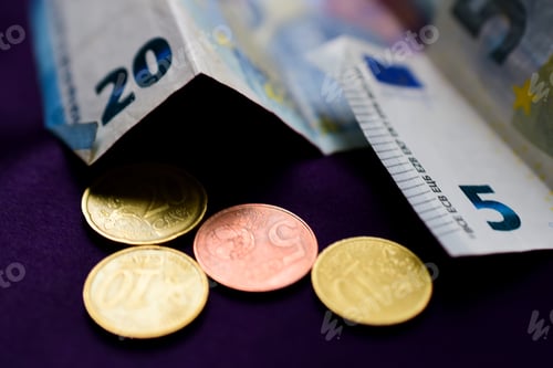 Preview: Cash euro money on purple background