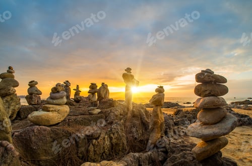 Preview: Stones pyramid on sand symbolizing zen, harmony, balance in Khao Lak Thailand