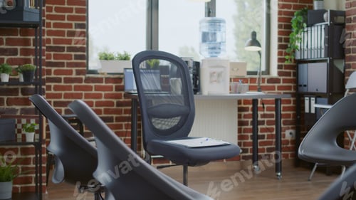 Preview: Empty room with aa meeting sign on white board and chairs in circle