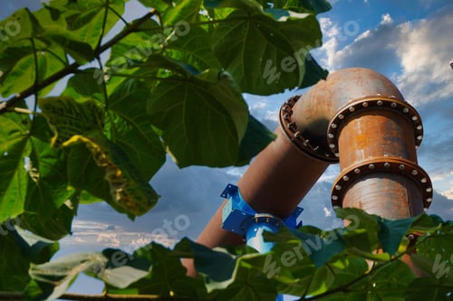Preview: Low-angle shot of a pipeline against the sky