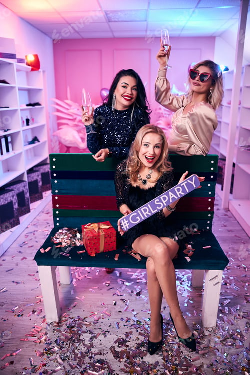 Preview: Three elegant women amusing themselves at the holiday party