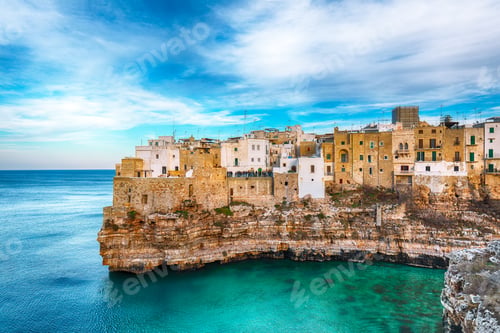 Preview: Polignano a Mare village on the rocks at sunset