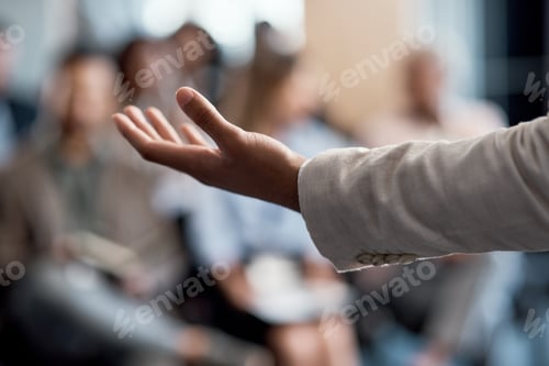 Preview: Any questions. Shot of an unrecognizable businessman delivering a presentation at a conference.