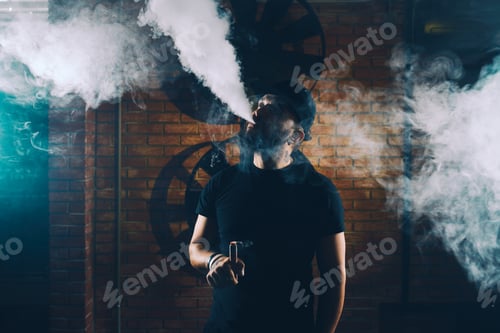Preview: Man vaping an electronic cigarette