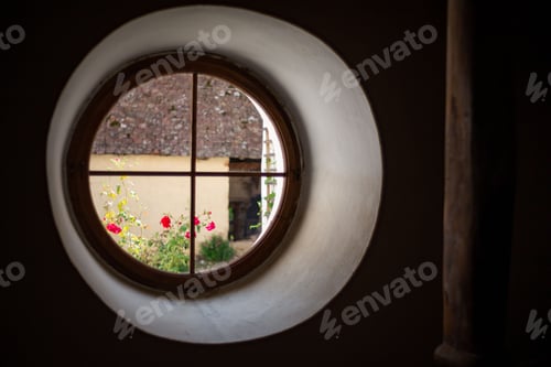 Preview: Beautiful round window overlooking a garden