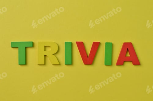 Preview: Colorful alphabet letters with text TRIVIA isolated on a yellow background