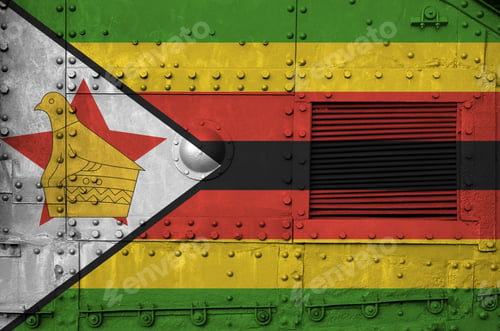 Preview: Zimbabwe flag depicted on side part of military armored tank close up