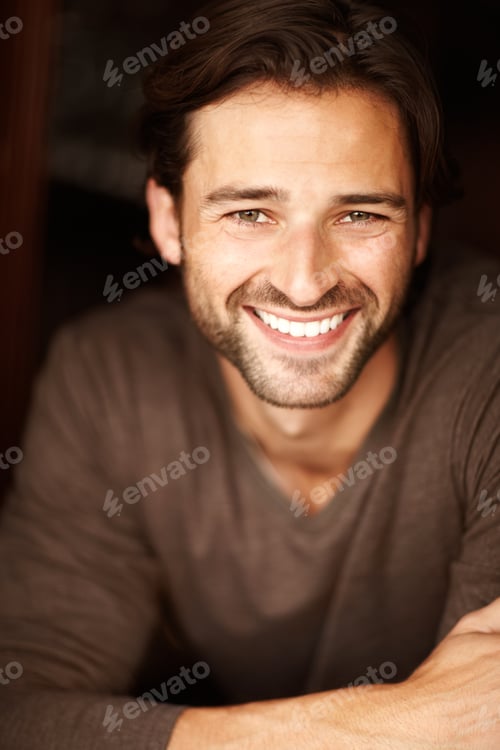 Preview: Hansome and happy with life. Portrait of a handsome young man smiling.