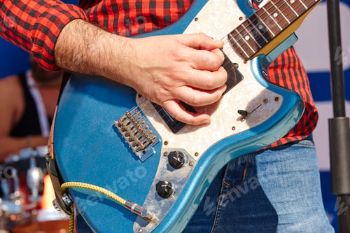 Preview: Rock guitar player musician detail. Musical instrument. Show