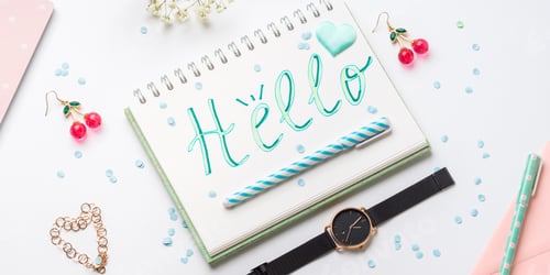 Preview: Spring girl accessories items flat lay. Hello word