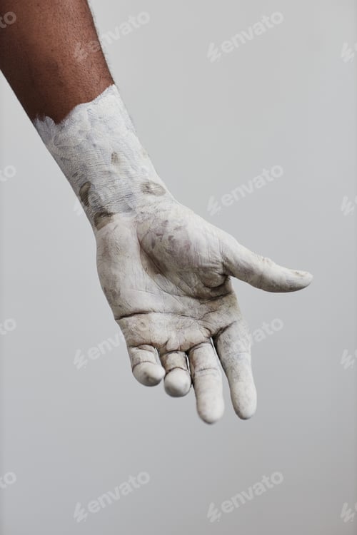 Preview: Hand covered in white paint minimal