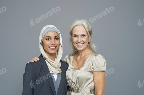 Preview: Studio portrait of two businesswomen