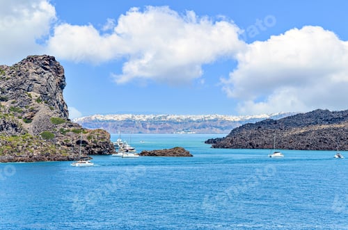 Preview: Picturesque scene of sailboats docked in a serene lagoon in the Aegean Sea, Greece
