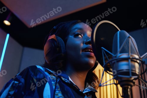 Preview: Young Singer Singing In Microphone