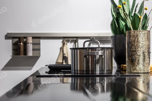 Preview: Close-up, modern steel pan in the interior of the kitchen.