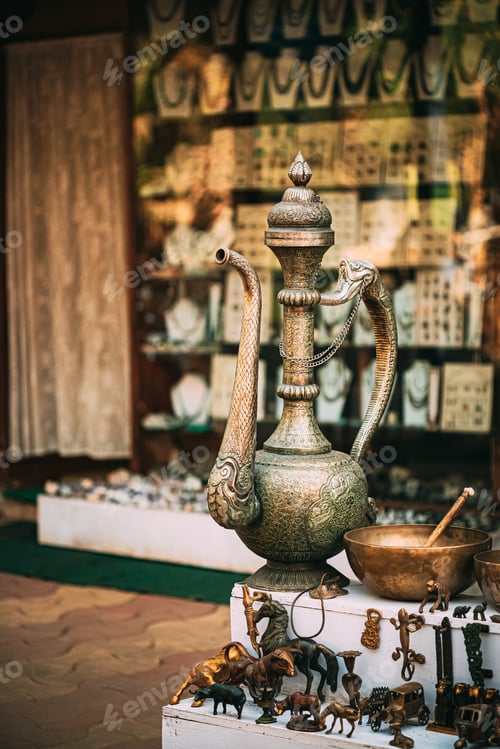 Preview: Goa, India. Oriental Copper Jug In Antique Shop