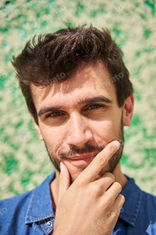 Preview: close-up portrait of a bearded man looking at the camera