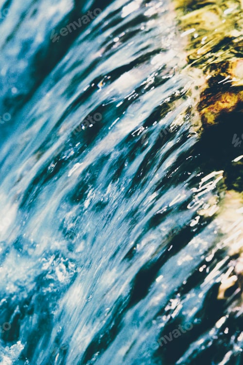 Preview: A small waterfall and reflections in river, shot on color infrared film