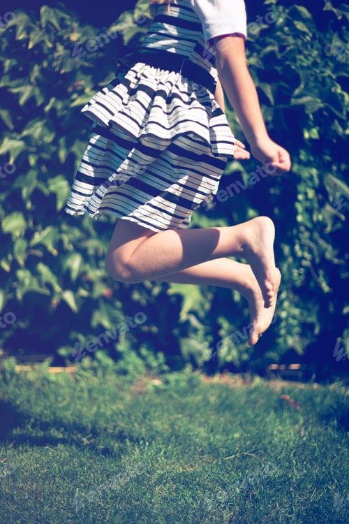 Preview: Little girl jumps.